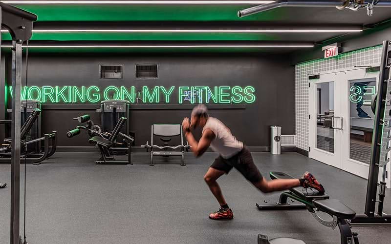 man working out in fitness center