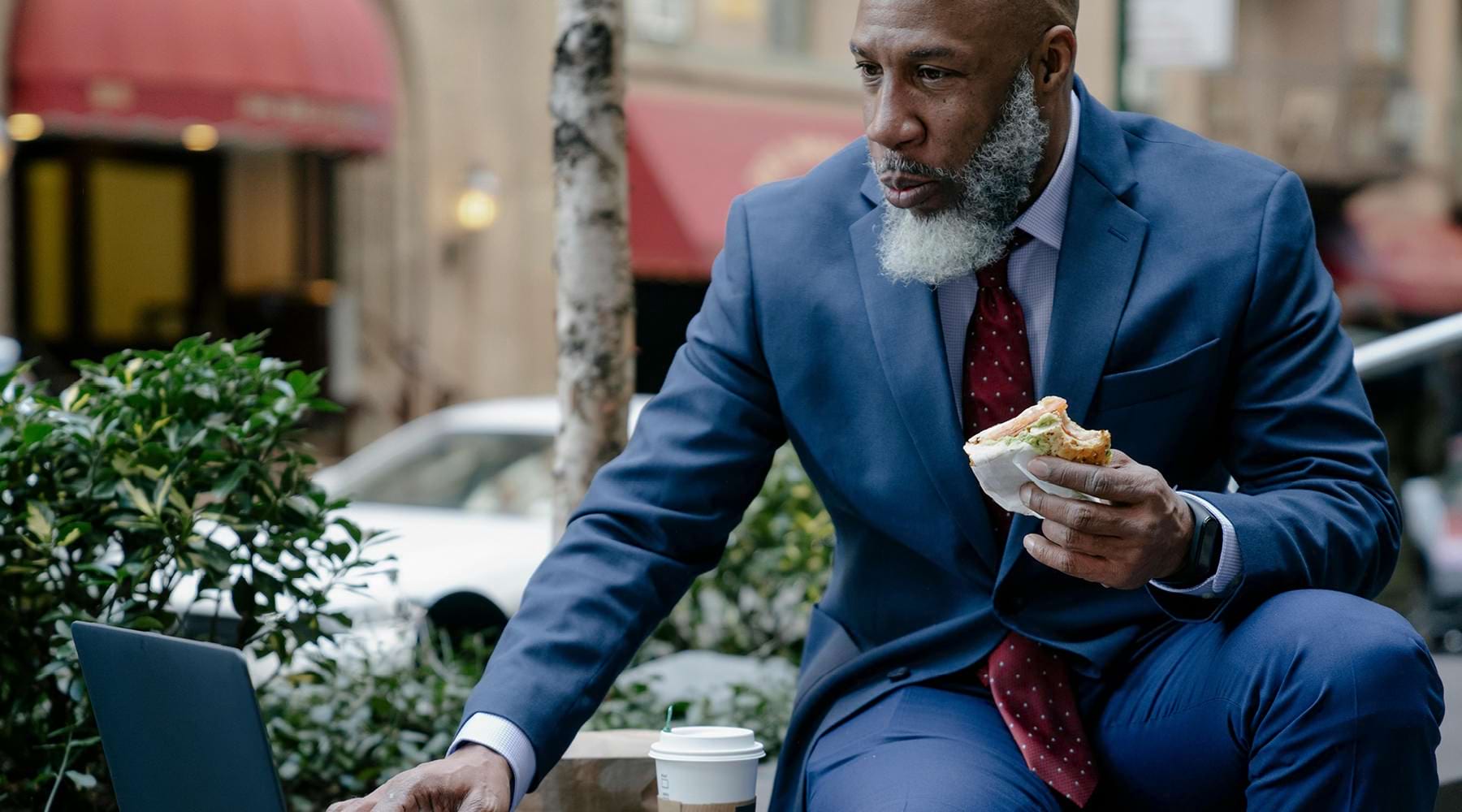 a man eating a sandwich
