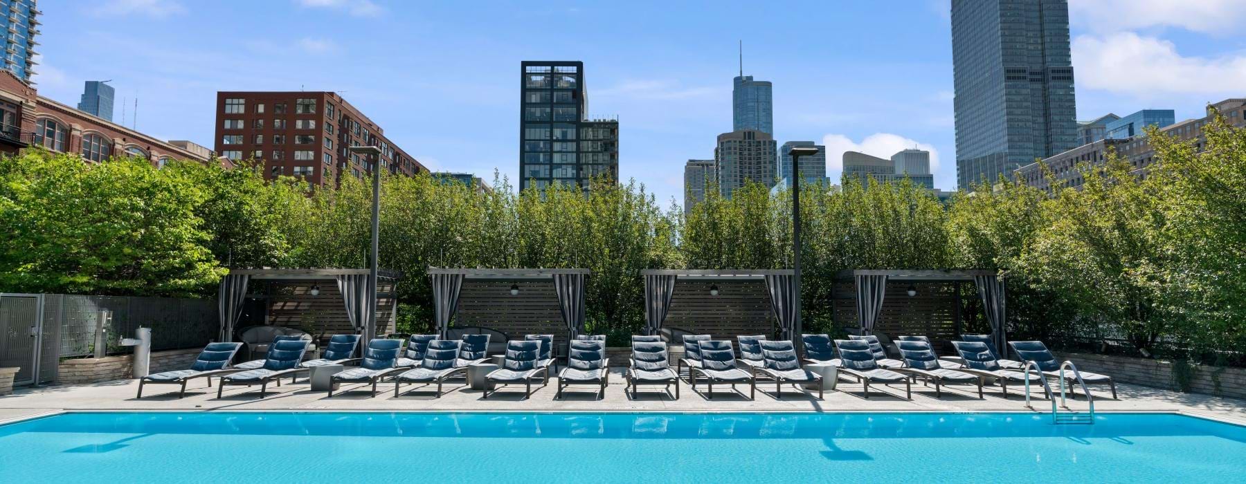 Outdoor pool and lounge area at Hubbard Place Chicago luxury apartments.