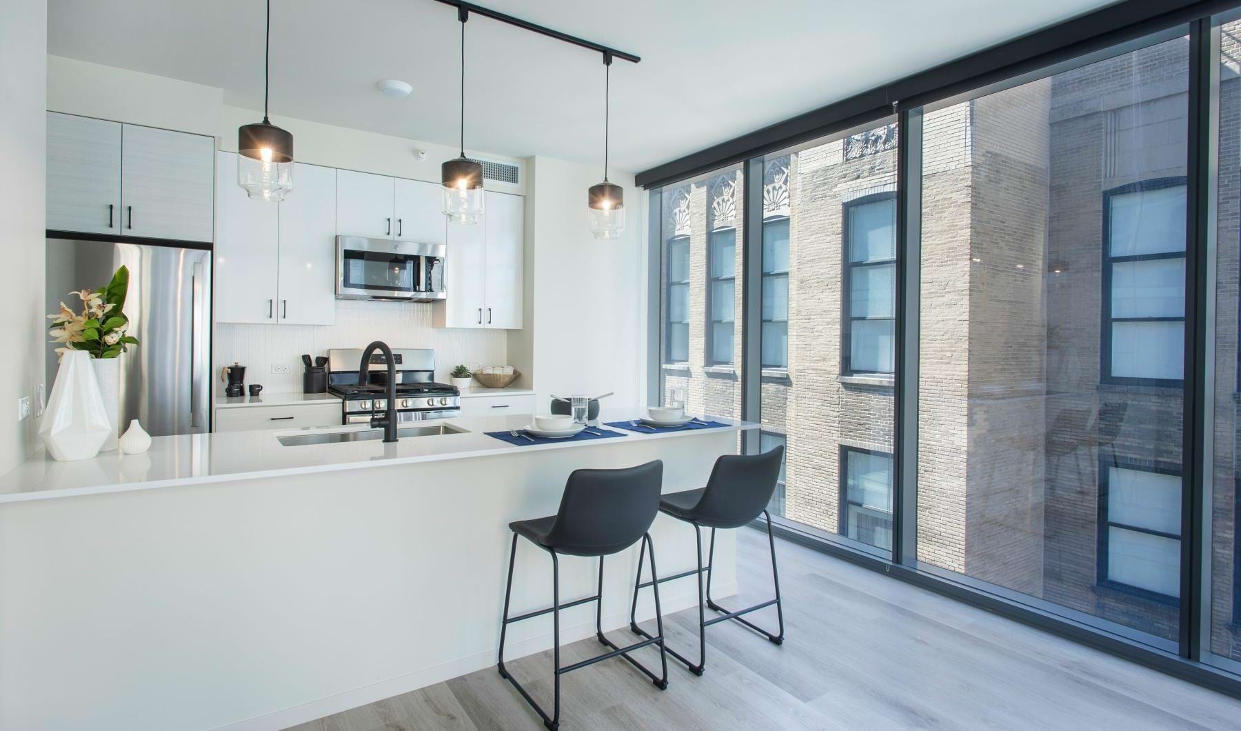 a kitchen with a large window