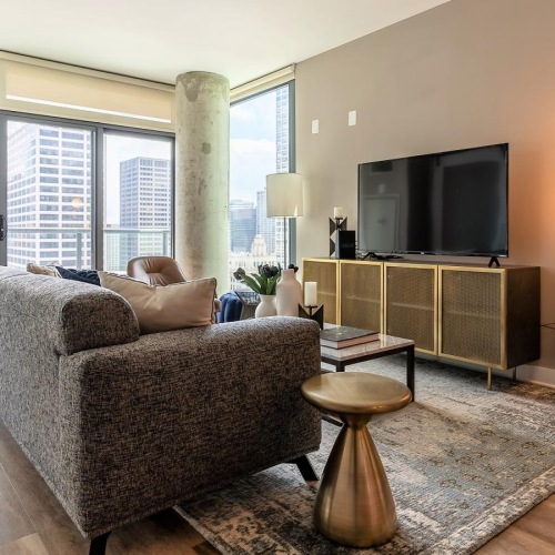 Living room with natural light at State and Grand apartments in River North, Chicago.	