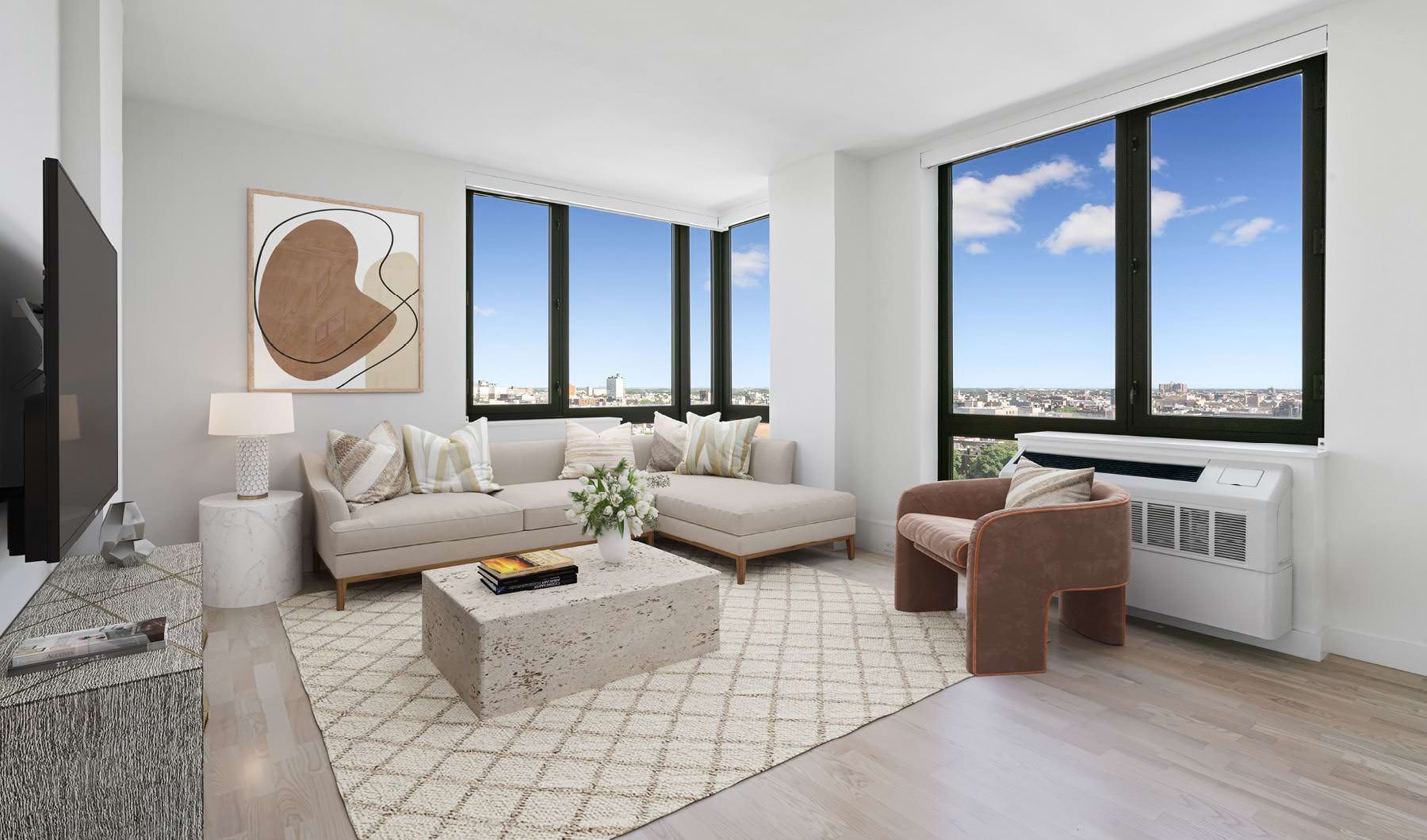 spacious lobby with high wall mosaic murals