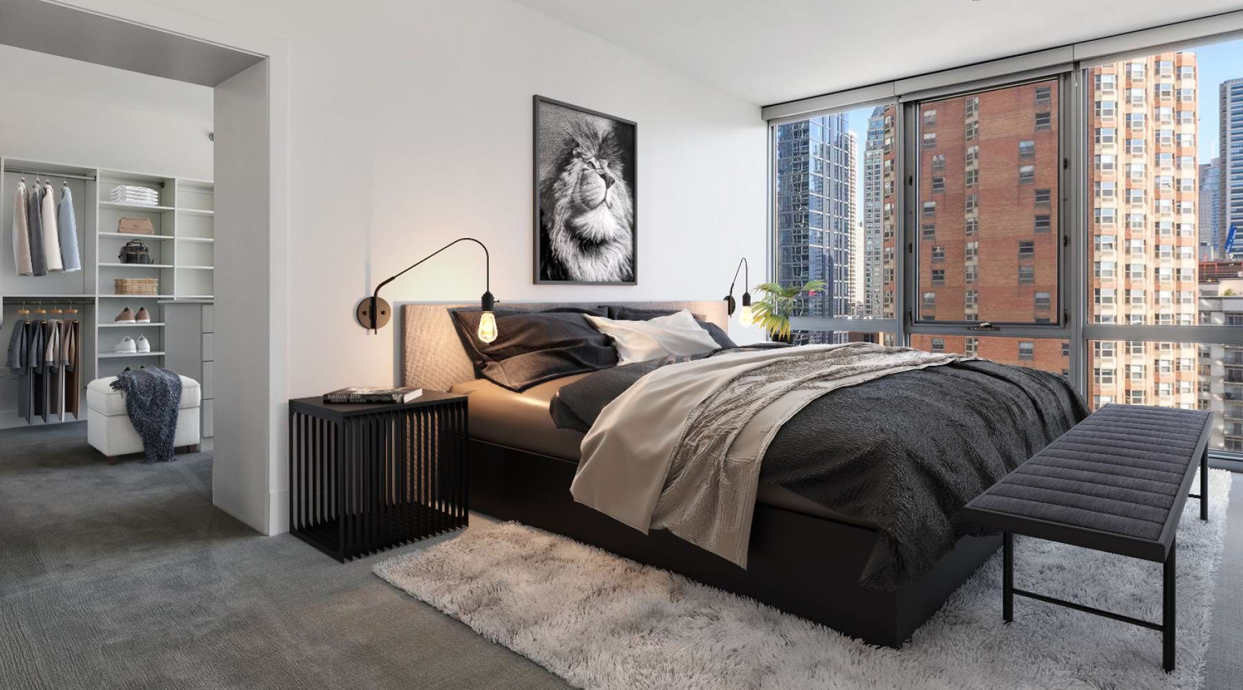 carpeted bedroom with city views