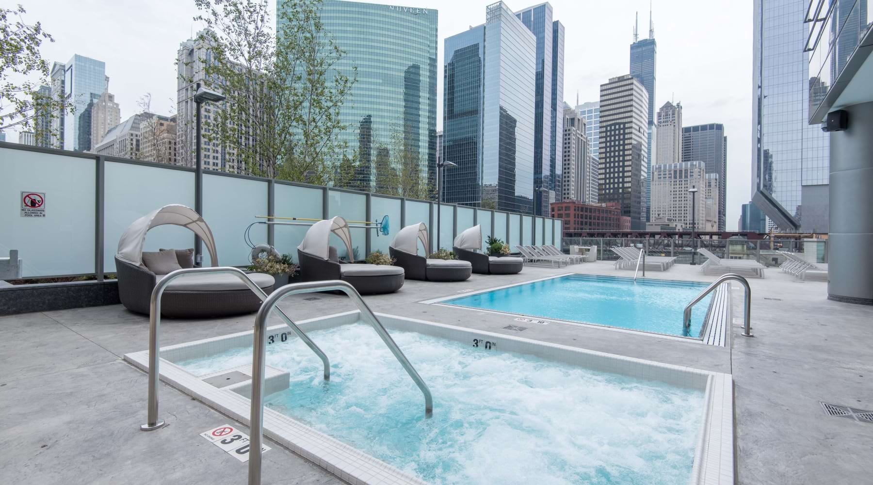 outdoor pool and hot tub at Wolf Point West