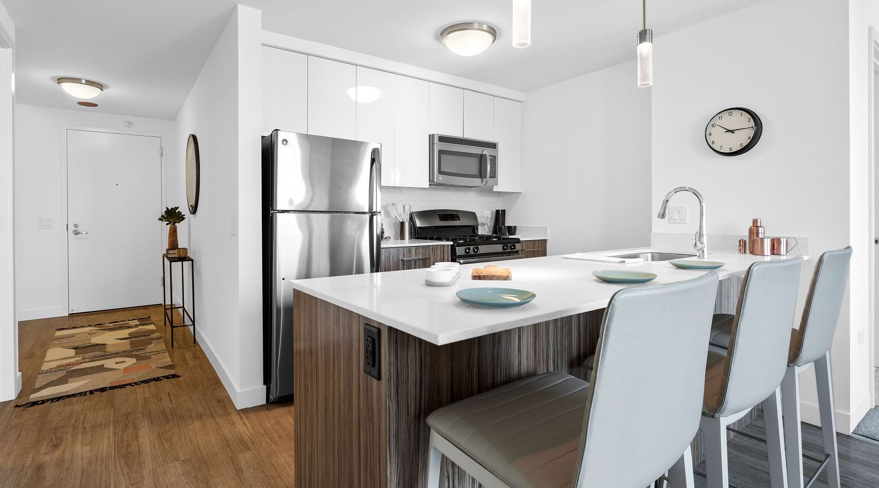 dining counter in kitchen with pendant lights